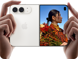 iPhone Duo, Star White color, held by two hands in horizontal orientation, unfolded, left panel shows 48MP Dual Fusion rear cameras, right panel shows person getting their picture taken on outer display, the subject of the photo is able to see their face as their picture is getting taken using Duo Preview