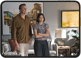 iPhone Duo, opened in horizontal position, Apple TV show "Shrinking" plays on screen